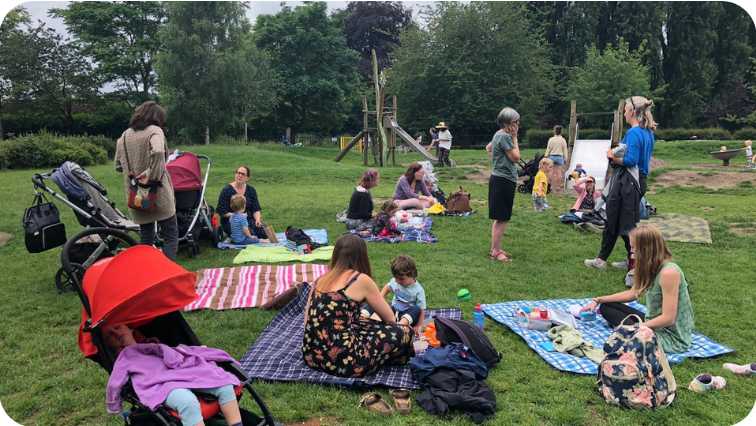 OBS volunteers at a picnic with their children in July 2021